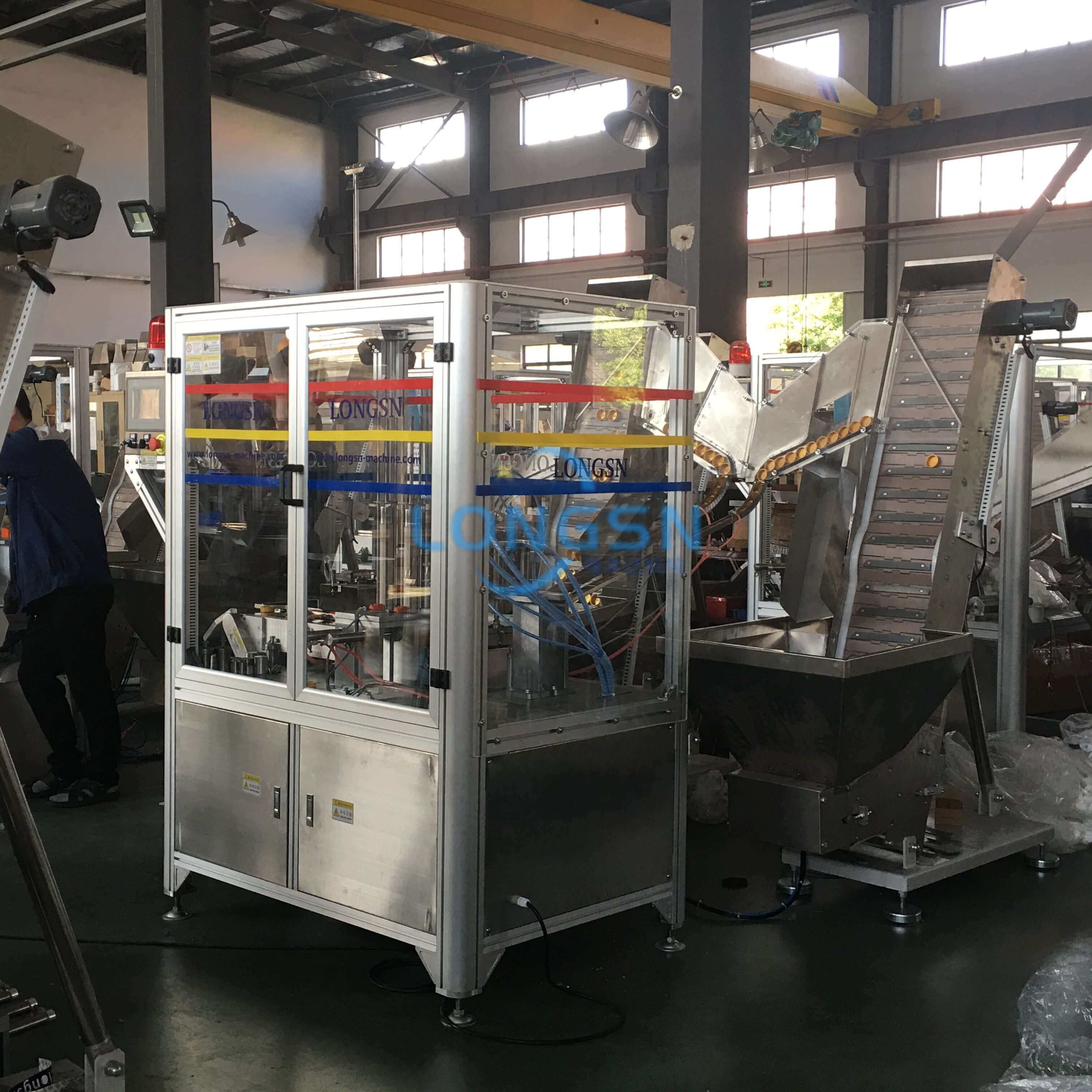 cap lining assembly machine
